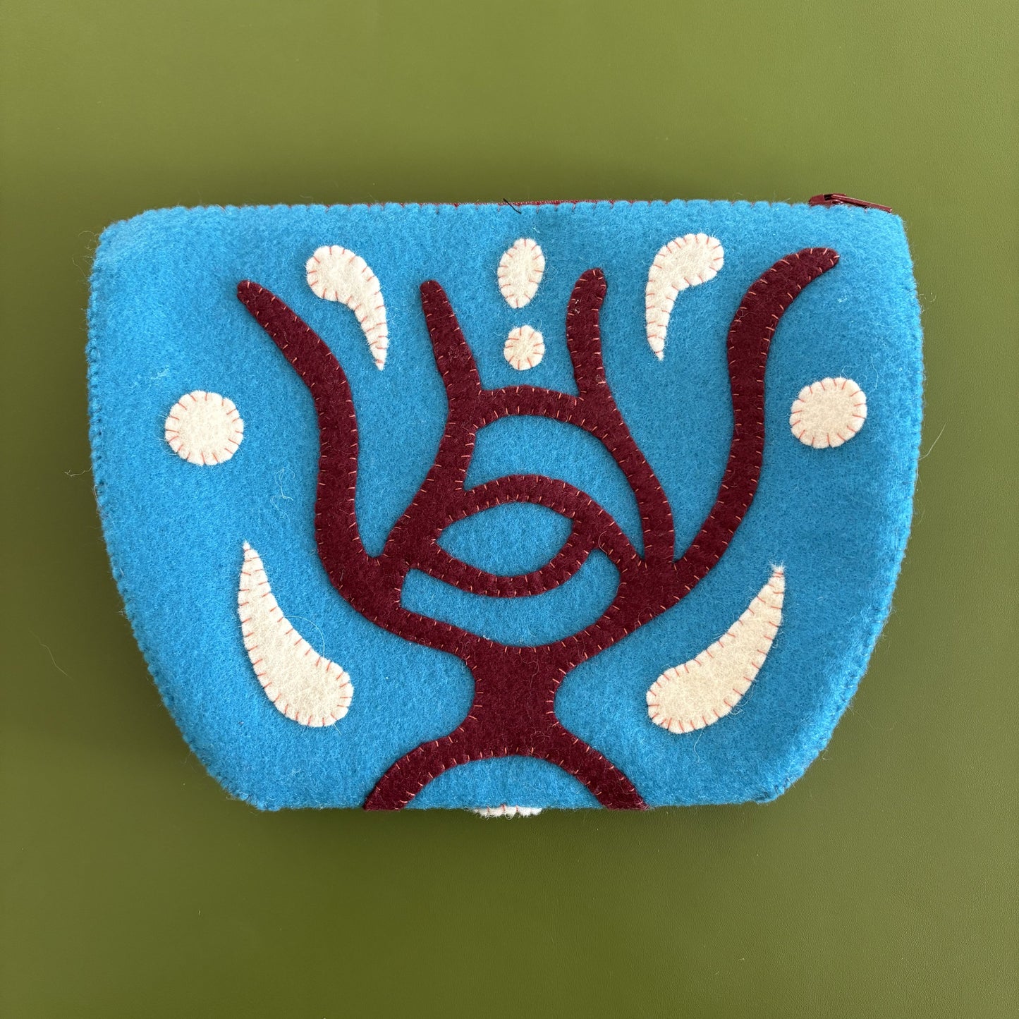 Felted zip pouches by Nancy Jackson - thespinninghand