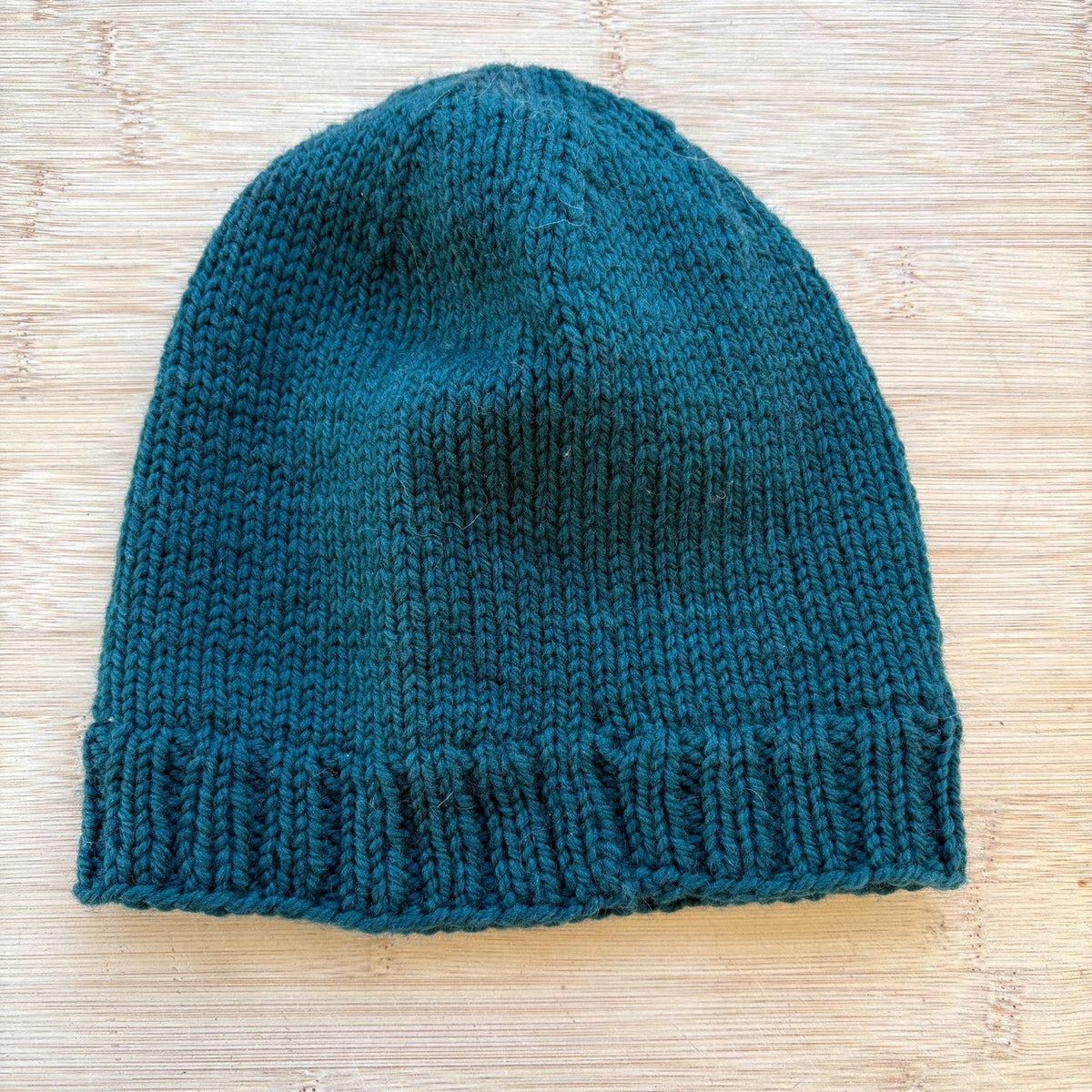 Wool Hat - hand knit dark green with heart - adult size - thespinninghand