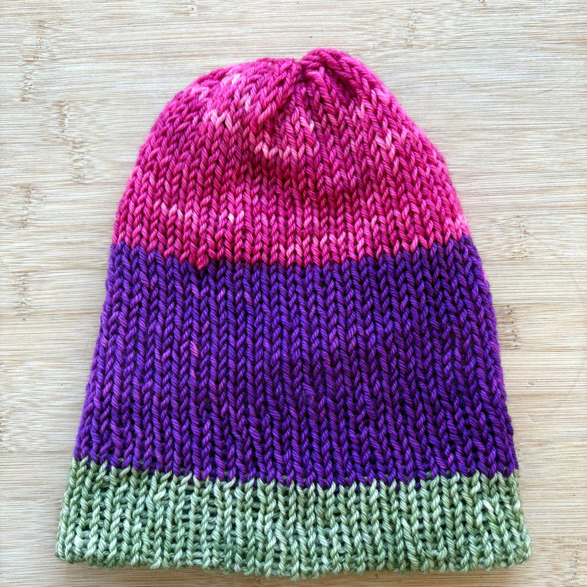 Wool Hat - reversible striped multi-colored pink and green - adult size - thespinninghand
